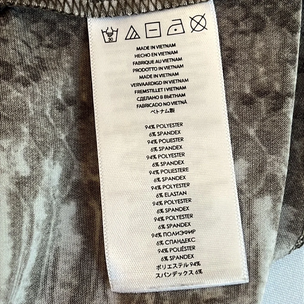 Micheal Kors size XL tan serpent print top ,year round alone or under jacket